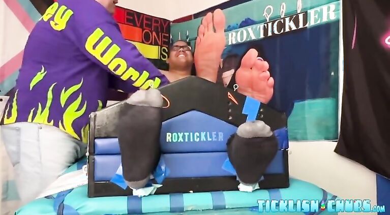 Bound fat guy endures tickling torment