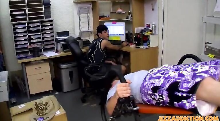 Young man has his mouth filled with large cock in threesome