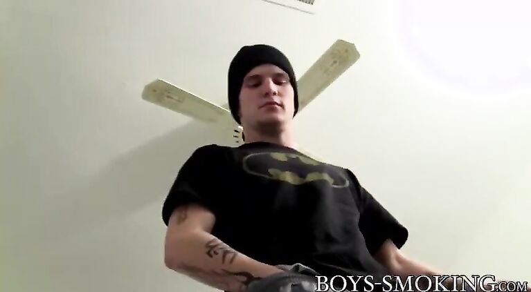 Inked emo twink smoking cigarettes while jerking off solo