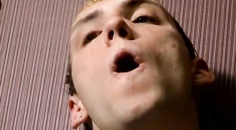 Smoking twink licks his own big fat cock and tugs it hard