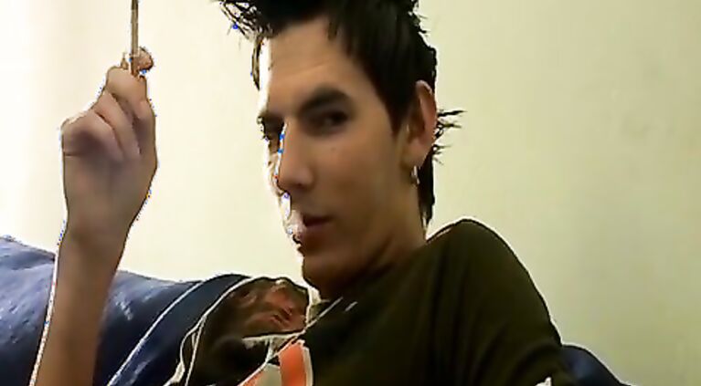 Solo masturbating twink smoking while cumming hard