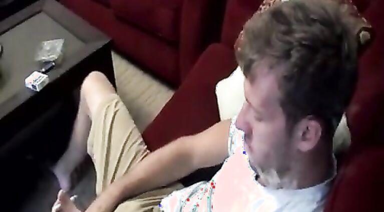 Jake Parker smokes and wanks his shaft