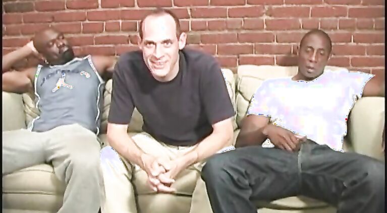 Middle aged white guy getting shared by black men